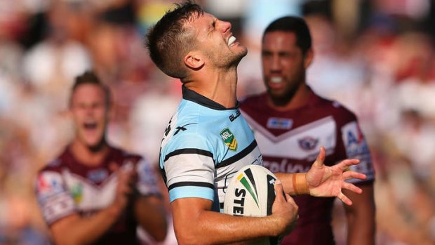 Beau Ryan of the Sharks reacts to a handover during the round six NRL match.