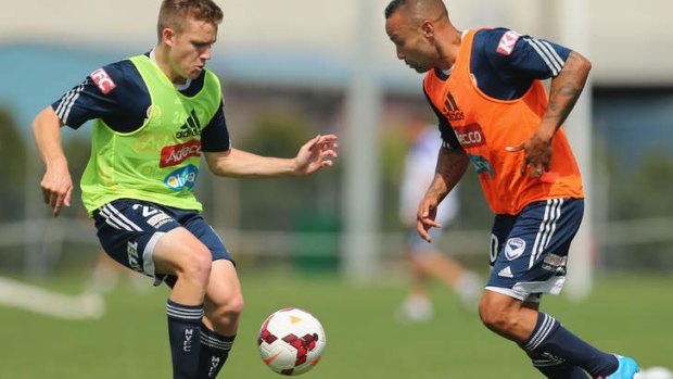 Fancy footwork: Archie Thompson and Scott Galloway (left) compete at Victory training.