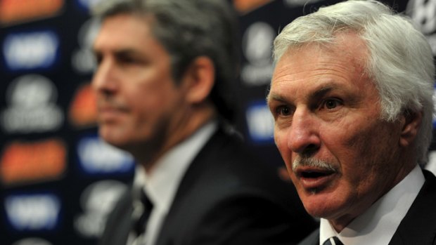 True Blue ... Mick Malthouse confirms his appointment as Carlton coach as club president Stephen Kernahan looks on.