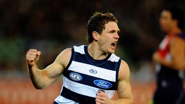 Joel Selwood celebrates  after kicking a goal in the first quarter.
