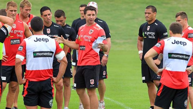 Calm before the Storm: St George Illawarra coach Steve Price talks to his players during training at WIN Stadium.