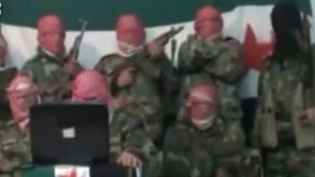 Armed and anonymous ... a video clip of fighters claiming to be Syrian army defectors.