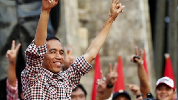 Man most likely: Indonesian presidential candidate Joko Widodo addresses supporters at a rally in Jakarta on Wednesday.