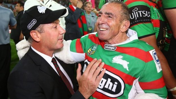 Red and green journey: Peter Holmes a Court (left) celebrates with the Rabbitohs’ mascot after Sunday’s grand final win.