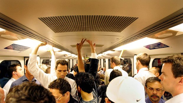 Standing room only ... A packed train on the Dandenong line.