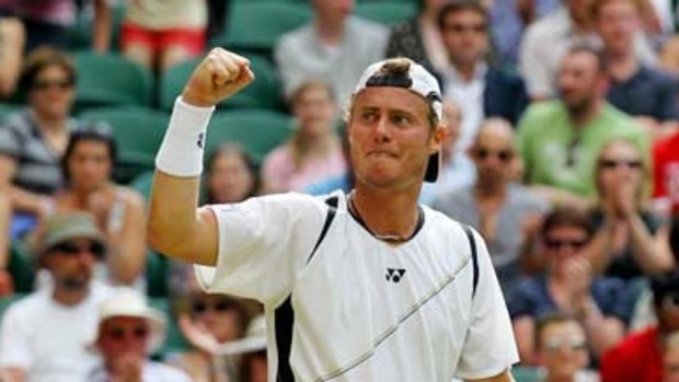 Lleyton Hewitt acknowledges the applause from the crowd during his match against Gael Monfils.