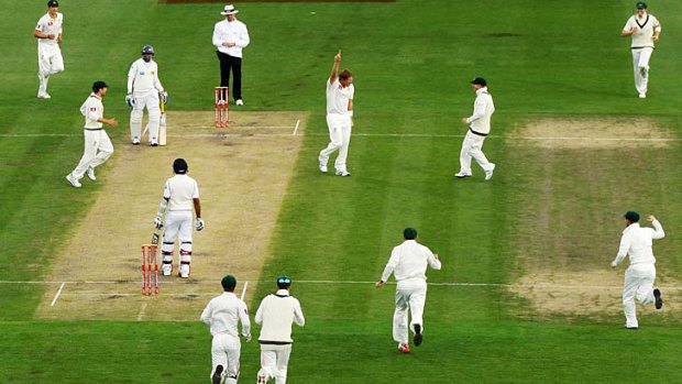 On target: Shane Watson celebrates taking the wicket of Sri Lanka's Mahela Jayawardene.