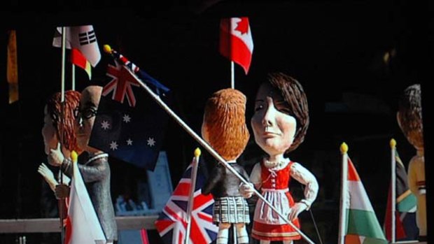 Right flag, wrong outfit . . . Julia Gillard is dressed in an Austrian costume in a window display in Seoul.