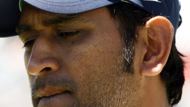 Good riddance: the feeble Mahendra Singh Dhoni is unlikely to be missed.
