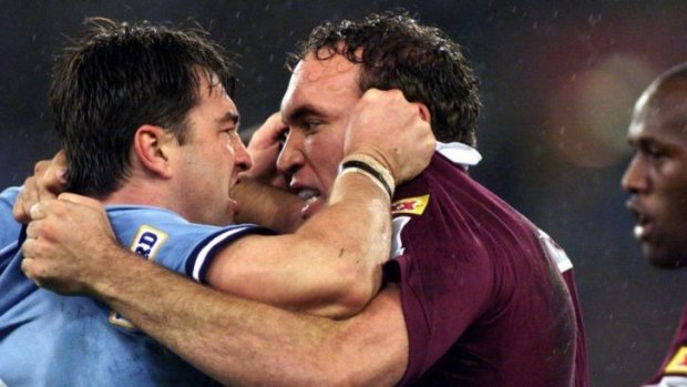 Different era: Gorden Tallis (R) squares up to Terry Hill during the State of Origin.