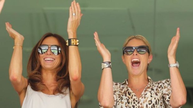 Kyly Clarke and fellow cricket WAG Candice Falzon cheer on their partners during the Ashes.