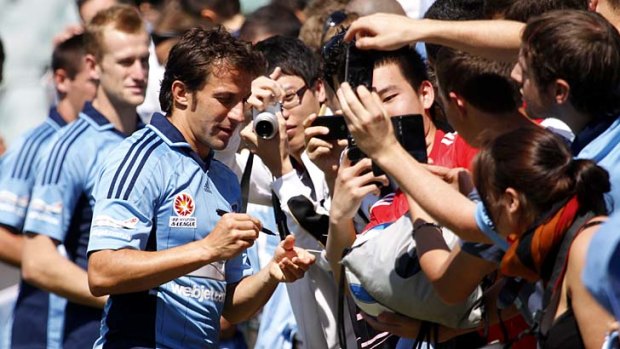 In demand ... Alessandro Del Piero signs autographs for his adoring fans.