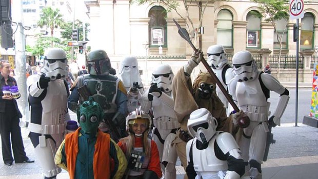 Star Wars fans dressed as characters from the films gather in Brisbane's CBD.