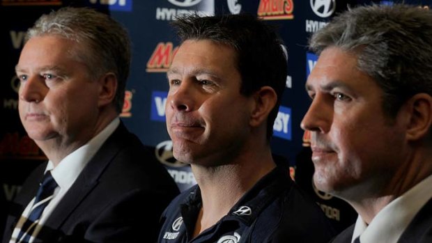 The Blues say payouts to Brett Ratten (centre) and other assistant coaches contributed to the loss.