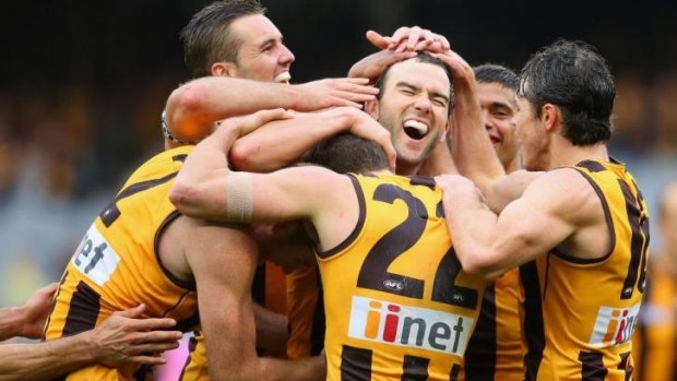 Flying high: Hawthorn players celebrate after belting St Kilda by 145 points. 