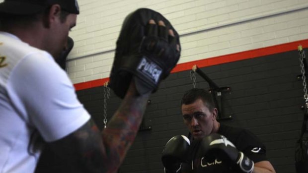 Kyle Noke and his brother train at a McMahons Point Gym.