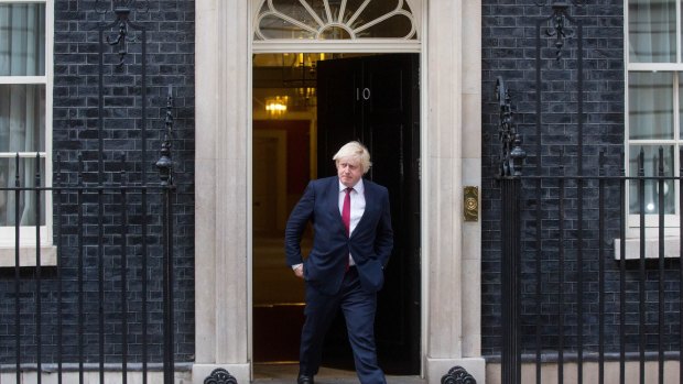 Boris Johnson, leaves after being named as UK foreign secretary, after a meeting with Theresa May, UK prime minister, at 10 Downing Street in London