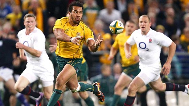 Digby Ioane breaks through into open space for the Wallabies.