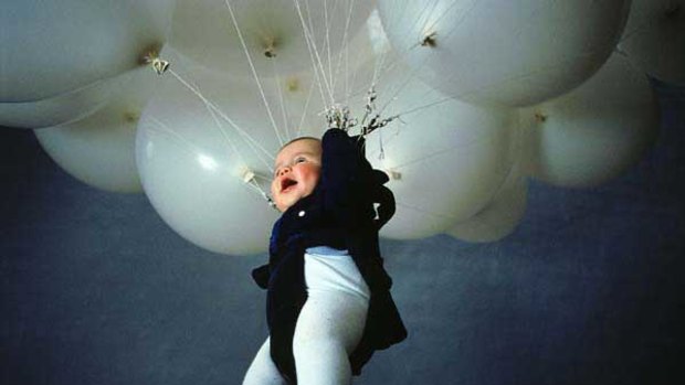 An airborne child in Fiona Tan's 2002 DVD <i>Tilt</i>.