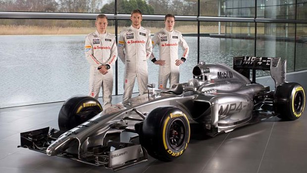 Nose job: Drivers (from left) Kevin Magnussen, Jenson Button and Stoffel Vandoorne with the new long-snouted McLaren-Mercedes MP4-29.