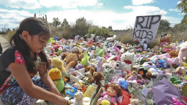 Faith pays tribute to the children who drowned at the memorial site in Wyndham Vale. 