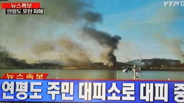 This frame grab taken off South Korean broadcaster YTN shows plumes of smoke rising from Yeonpyeong island in the disputed waters of the Yellow Sea.