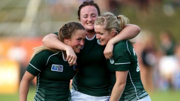 Historic win: Ashleigh Baxter, Ailis Egan and Vikki McGinn of Ireland celebrate their historic win over hot World Cup favourites New Zealand.