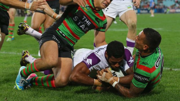 "No try": An unsighted Shayne Hayne ruled against the Storm's Sisa Waqa who grounded the ball against the Rabbitohs on Friday.