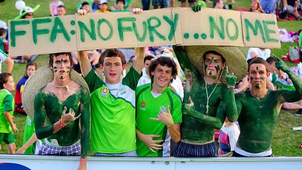Sound and the Fury . . . North Queensland fans show exactly what they think of the FFA's decision to axe their club from the A-League.