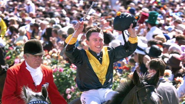 Career highlight: Chris Munce celebrates his 1998 Melbourne Cup triumph on Jezabeel.