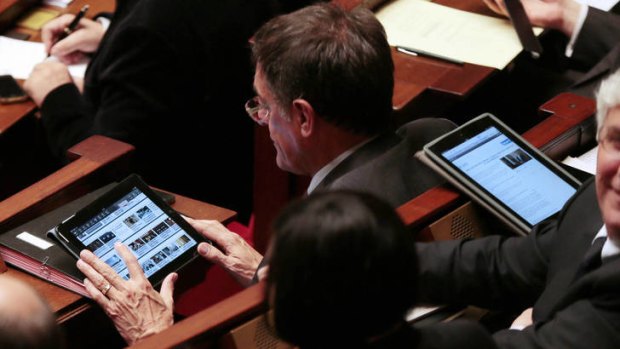 Debate: French MPs using tablets in the National Assembly.