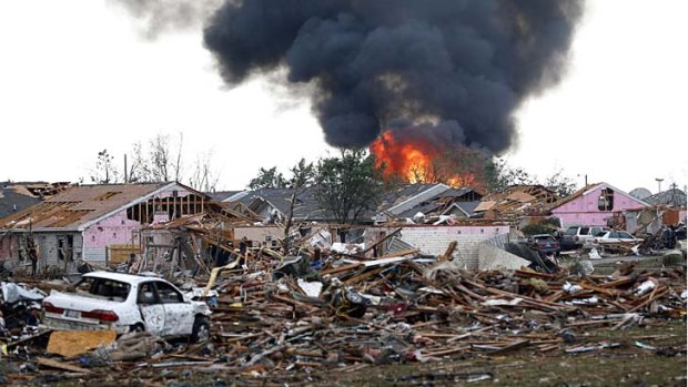 Fire and destruction: The Plaza Towers Elementary School blazes in Moore.