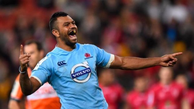Happy chappy: Kurtley Beale celebrates after scoring for NSW.