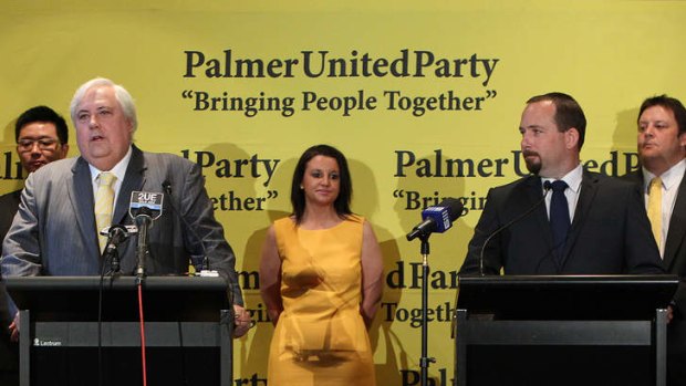 Clive Palmer from Palmer United Party with Senators-elect Ricky Muir (right) and behind from left Zhenya Wang (WA), Jacqui Lambie (Tasmania) and Glenn Lazarus (Queensland).