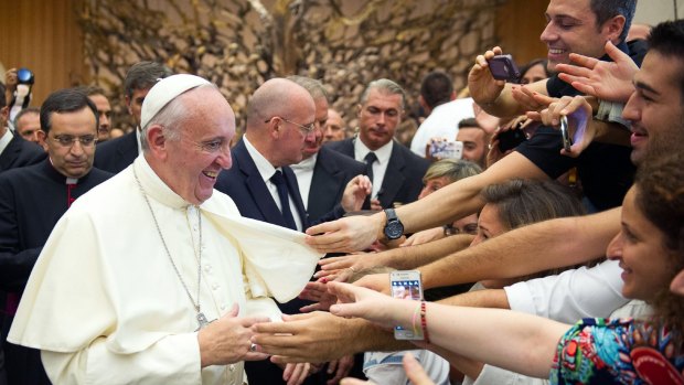 Pope Francis greets the faithful at the Vatican at the weekend. 