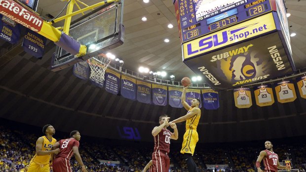 Up and over: Ben Simmons gets a shot away against Oklahoma forward Ryan Spangler.