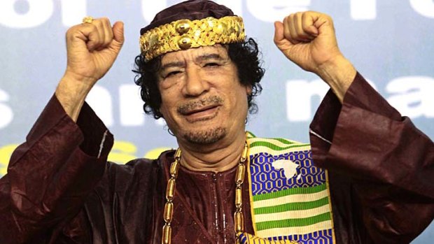 Always outspoken ...  Muammar Gaddafi gestures as he attends the Second Forum for Kings, Sultans, Princes, Sheikhs and Mayors of Africa in Tripoli in September 2010.