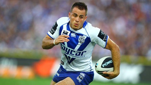 On the run ... Dogs' five-eighth Josh Reynolds.