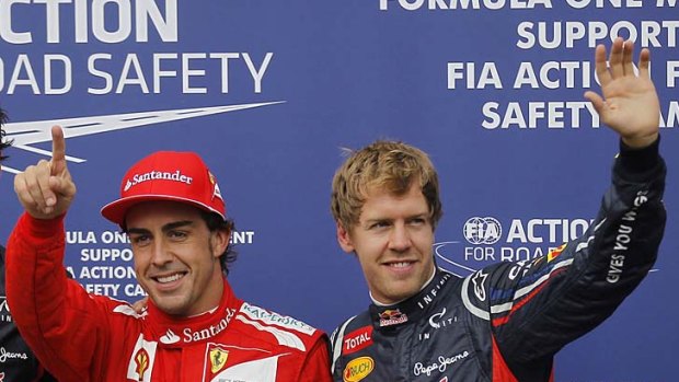 Title rivals: Fernando Alonso (left) and Sebastian Vettel will battle for the drivers' championship in Brazil.