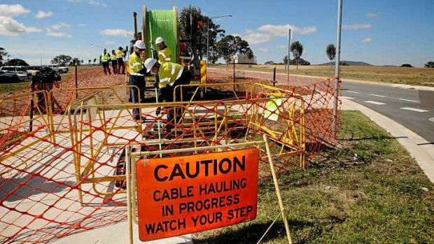 Fibre optic cable being layed in the Canberra suburb of Gungahlin in April 2013.