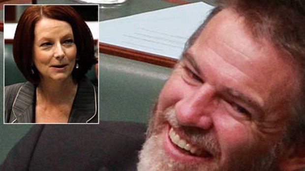 Taking it on the chin ... Rob Oakeshott laughs off the Prime Minister's bagging of his beard.