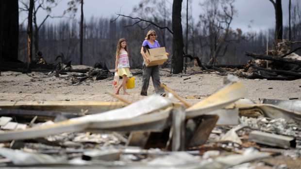 Krissy Travers and her daughter Maleah deliver supplies to those affected by the Callignee fires.