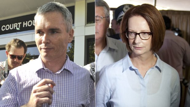 Surprise &#8230; Craig Thomson leaves Wyong court, while Julia Gillard toured a flood evacuation centre in Bundaberg.