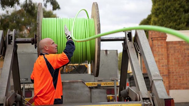 Opposition communications spokesman Malcolm Turnbull says new houses are being left behind by slow NBN rollout.