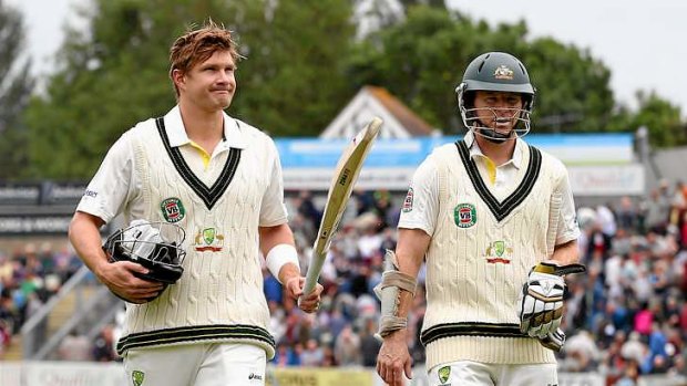 Shane Watson and Chris Rogers of Australia leave the field at the lunch break during day one of the tour match against  Worcestershire.