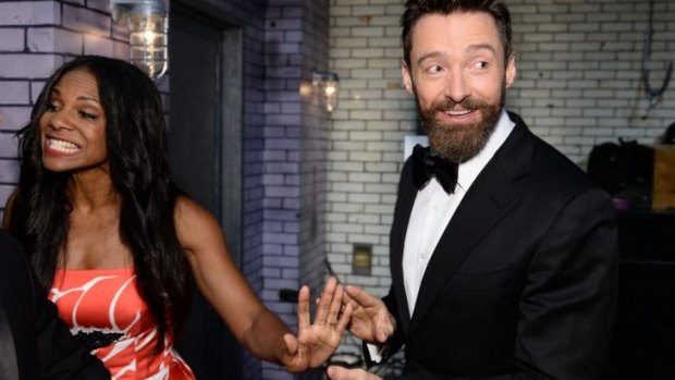 Backstage ... Actors Audra McDonald (L) and host Hugh Jackman at the 68th Annual Tony Awards at Radio City Music Hall.