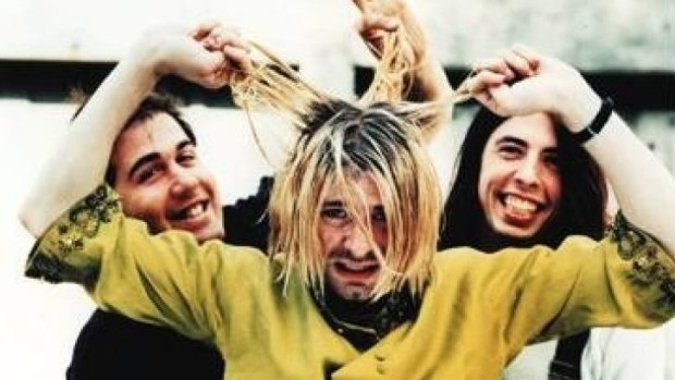 Kurt Cobain (centre) with fellow Nirvana members bass player Krist Novoselic (left) and drummer Dave Grohl (right) now of The Foo Fighters.