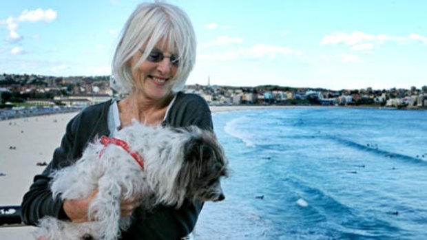 Lenore Kulakauskas, 65, at Bondi beach with her dog, Benji.