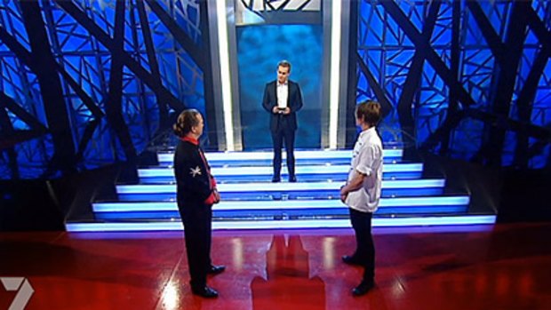 Standing tall ... Grant Denyer gets a little help from the set designers.