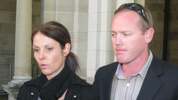 Gordon Nuttall's daughter Lisa Adams and husband Harley, outside Parliament House.